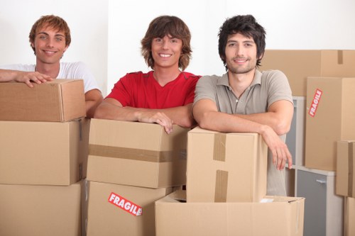 Local team collecting sofas and tables from a Ruxley property
