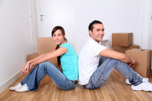 Unpacking boxes and setting up a new home after a move in Ruxley